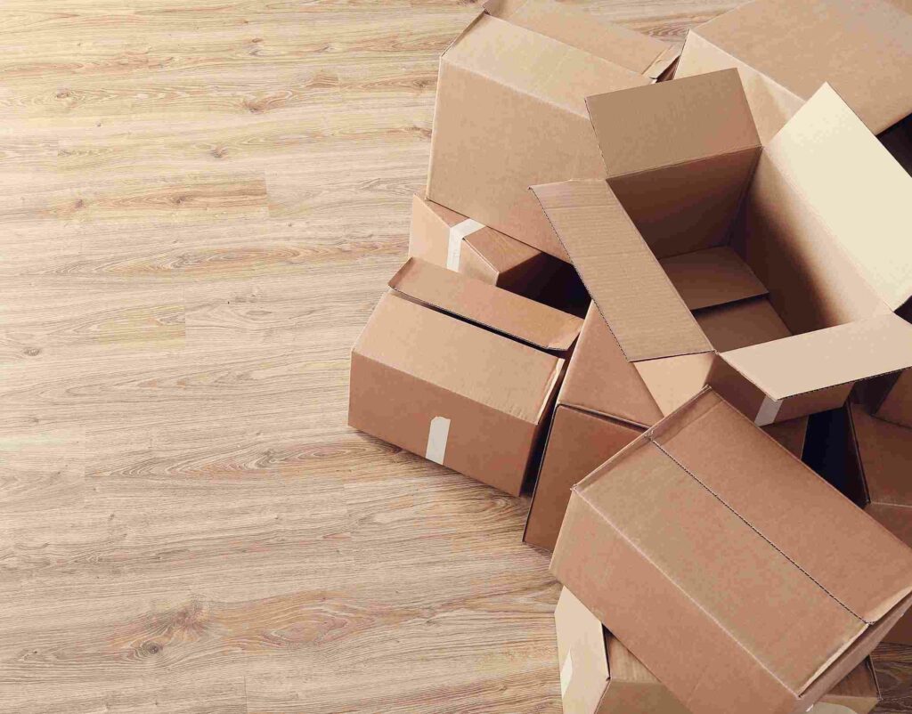 moving home with cardboard boxes 11zon (1) Débarras d'encombrants à lyon
